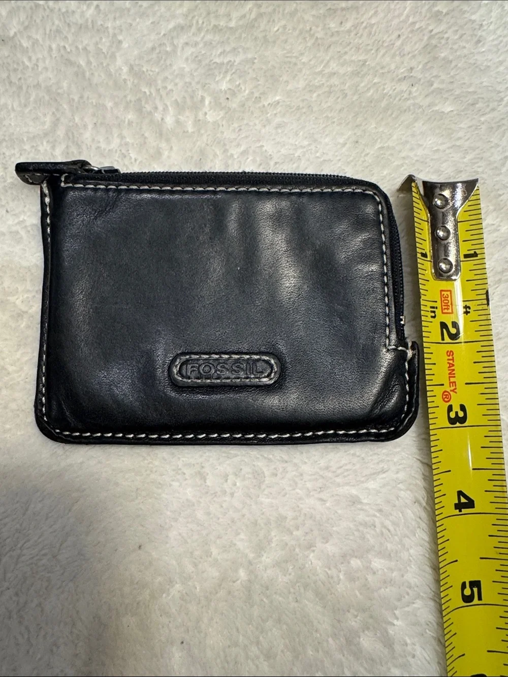 Fossil black leather mini wallet.